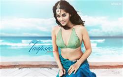 taapsee pannu in sky blue saree photoshoot on a beach
