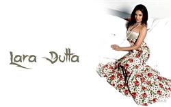 Lara Dutta Lying on Bed Wallpaper 