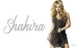 Shakira With Blond Hair and  Black Outfits