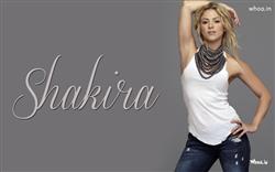 Shakira With a White Top on a Grey Background