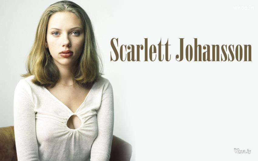 Scarlett Johansson Sitting On Sofa