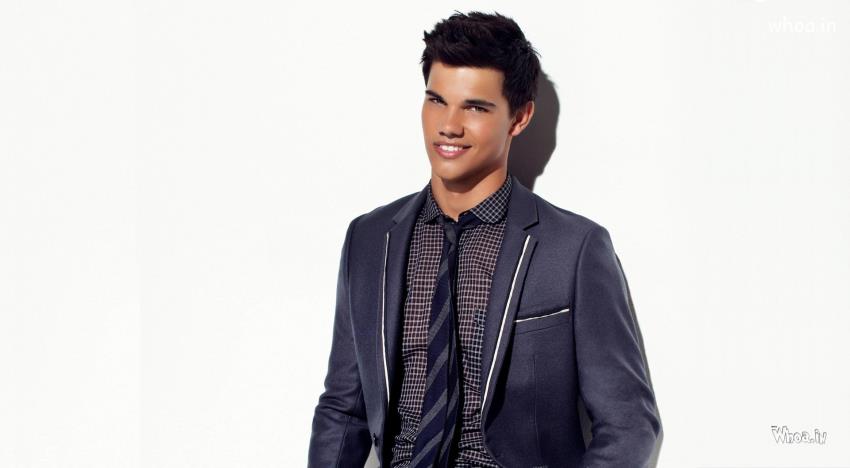 Taylor Lautner Blue Suit With White Background