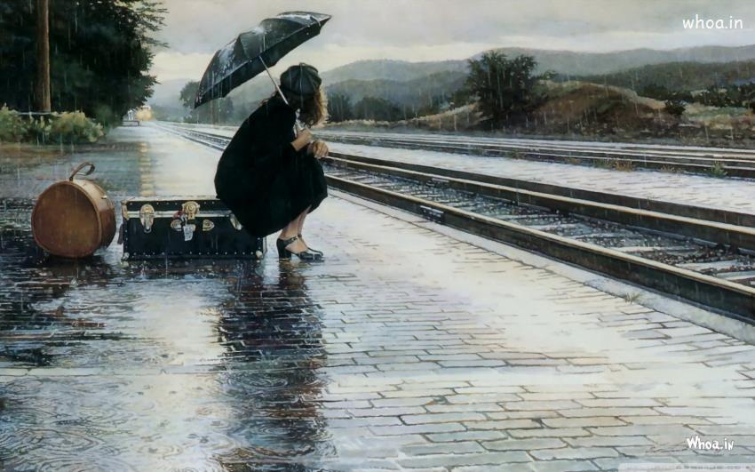 Alone And Lonely Girl Sitting On A Railway 