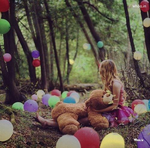 Girl With Bear Toy And Baloons Natural Image