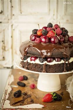 chocolate cake with strawberries and cherries 