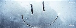 smiley face on a wet glass facebook cover