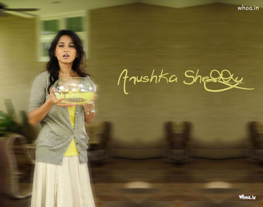 Anushka Shetty With Small Fish Tank