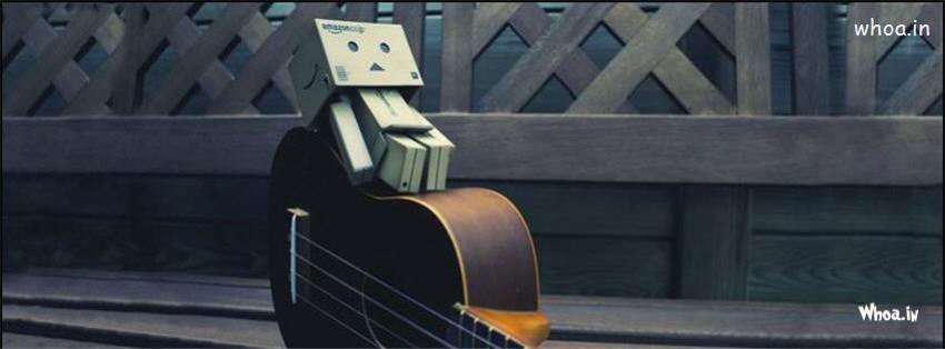 Danbo Robot Sitting On A Violin Fb Cover