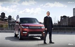 Daniel Craig James Bond with Red Range Rover Car