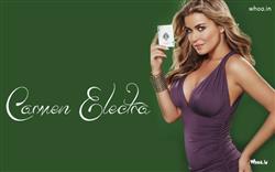 Hot Carmen Electra Poses Holding a Playing Card