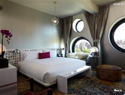 Imperior White Bedroom with Rounded Shape Window Design