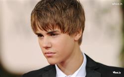 Justin Bieber Brown Hair Style with Face Closeup Wallpaper
