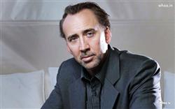 Nicolas Cage Wearing Black Suit with White Background Wallpaper