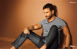Saif Ali Khan Black and White T-shirt with Brown Background Wallpaper