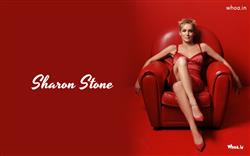 Sharon Stone Sitting on Red Sofa