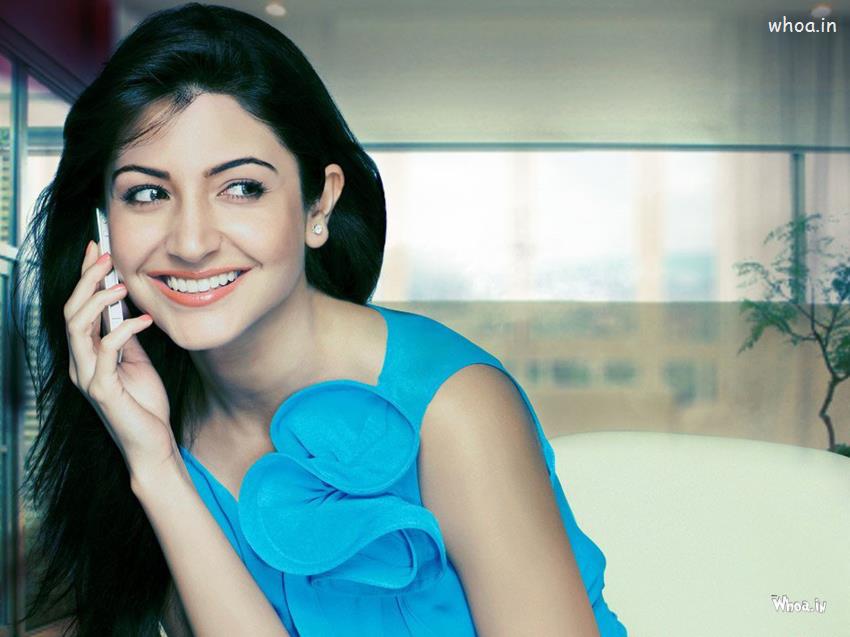 Anushka Sharma Blue Top With Smiley Face Closeup Wallpaper