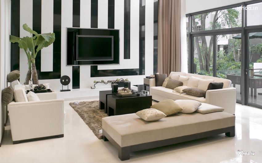 Black And White Wall With A White Branded Sofa