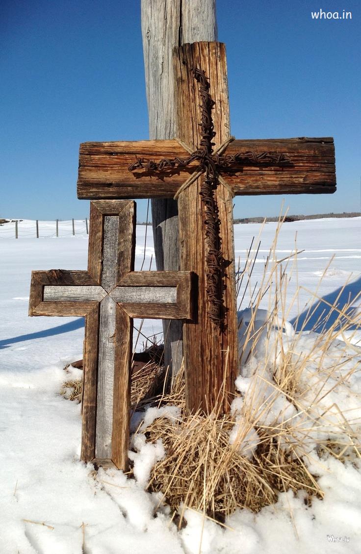 Christian Cross In Snow