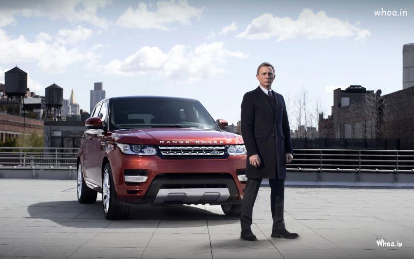 Daniel Craig James Bond With Red Range Rover Car