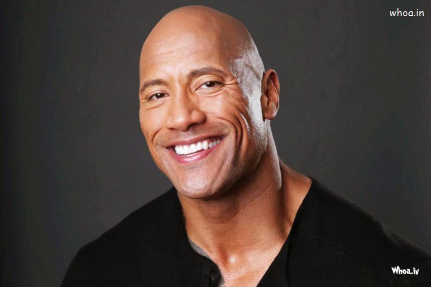 Dwayne Johnson-The Rock Dark Background With Smiley Face Closeup