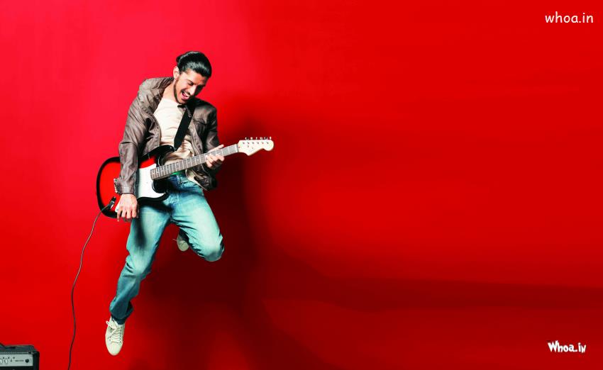 Farhan Akhtar Playing Guitar With Red Background HD Wallpaper