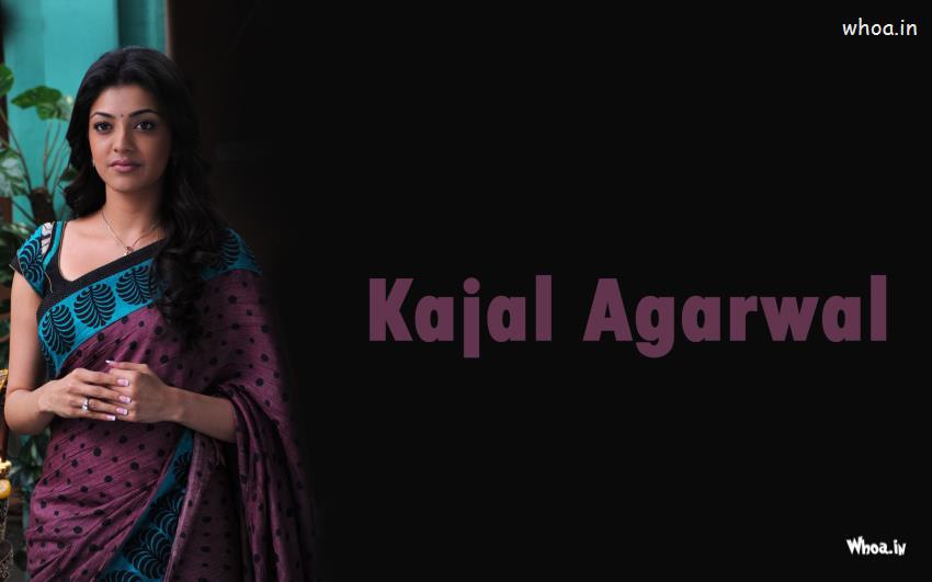 Kajal Agarwal Poses In Purple Saree