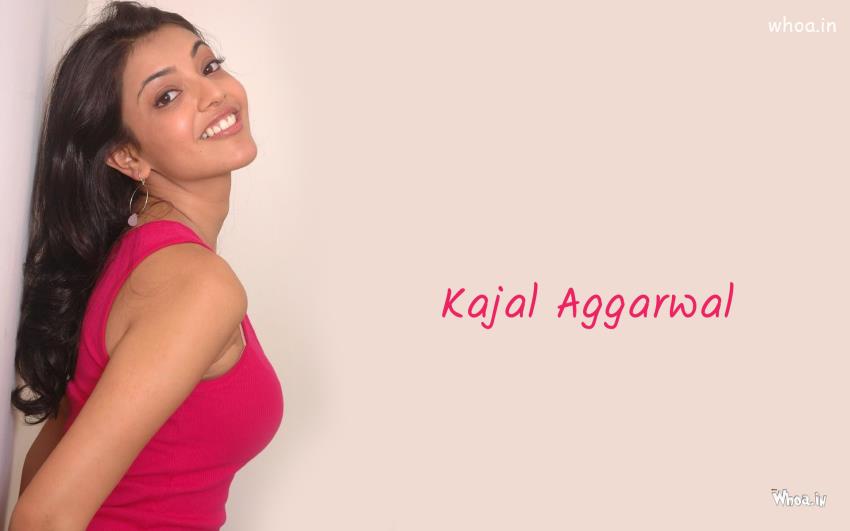Kajal Aggarwal With Pink Top And Face Close Up Wallpaper