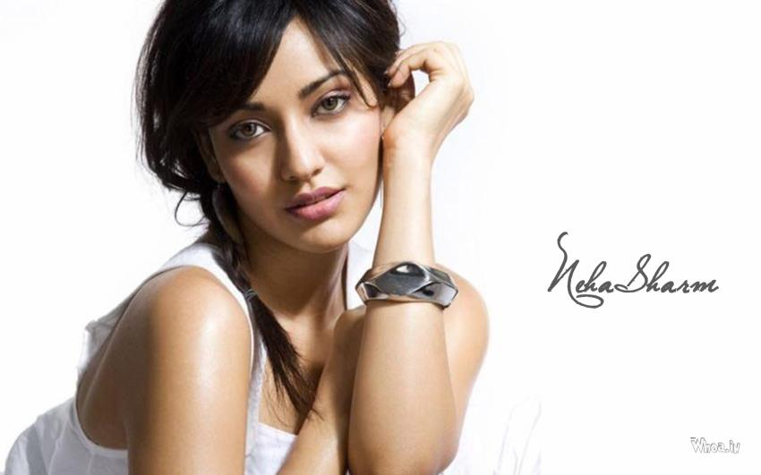 Neha Sharma In White Hot Top And Face Close Up Photoshoot