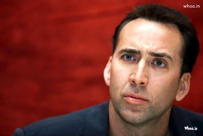 Nicolas Cage Face Closeup With Red Background Image