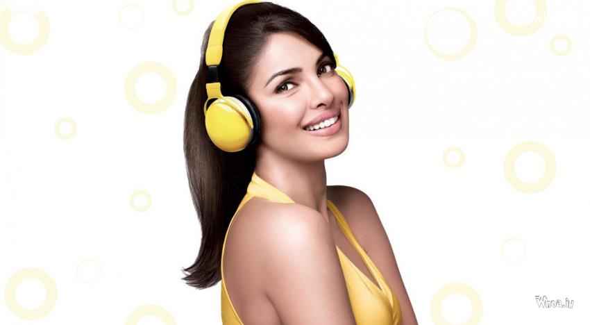 Priyanka Chopra Yellow Dress And Listening Music In Yellow Headphone