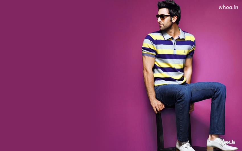Ranbir Kapoor Setting On Chair With Pink Background Wallpaper