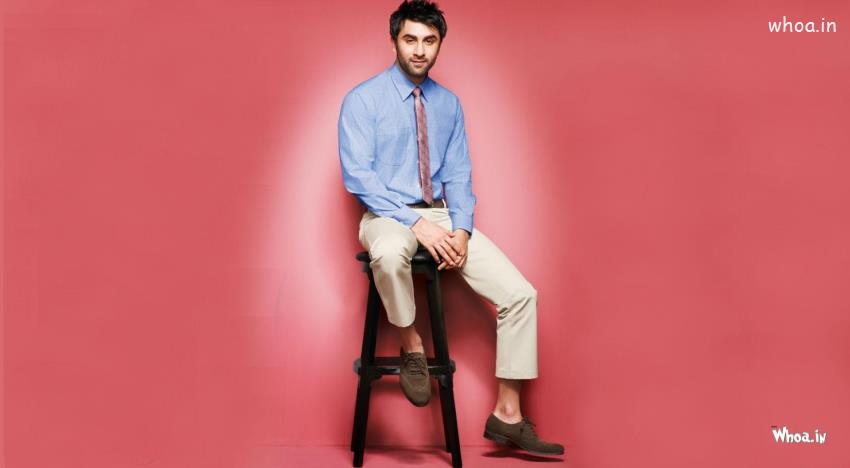 Ranbir Kapoor In Blue Shirt With Red Background Wallpaper