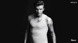 David Beckham Body Tattoo with Dark Background Wallpaper