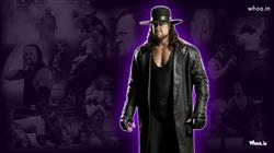 The Undertaker Black Coat and Cap with His Fight Background Wallpaper
