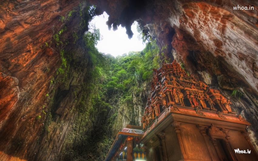 A Shrine For The Hindu God Murugan In The Middle Of A Large Cavern