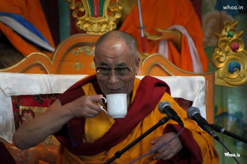 Dalai Lama With Cup Of Tea HD Wallpaper