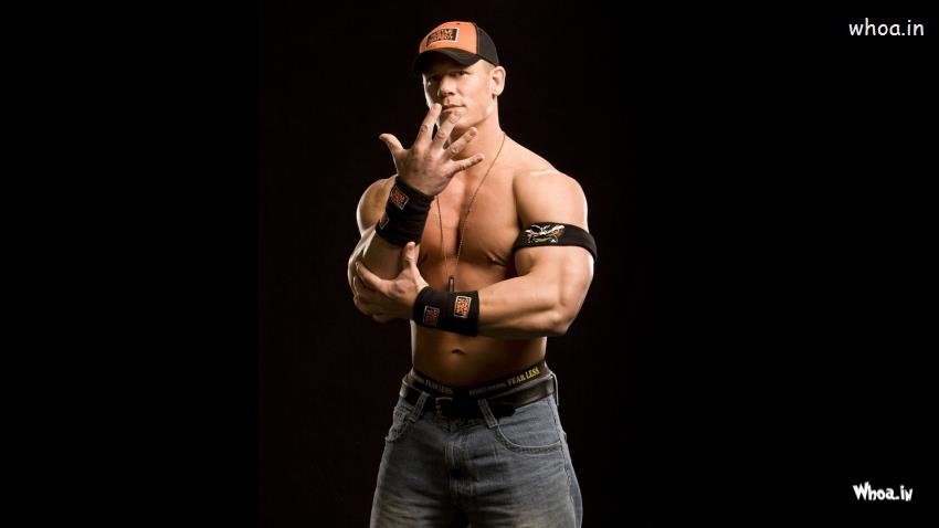 John Cena Favourite Style Poses With Dark Background Wallpaper
