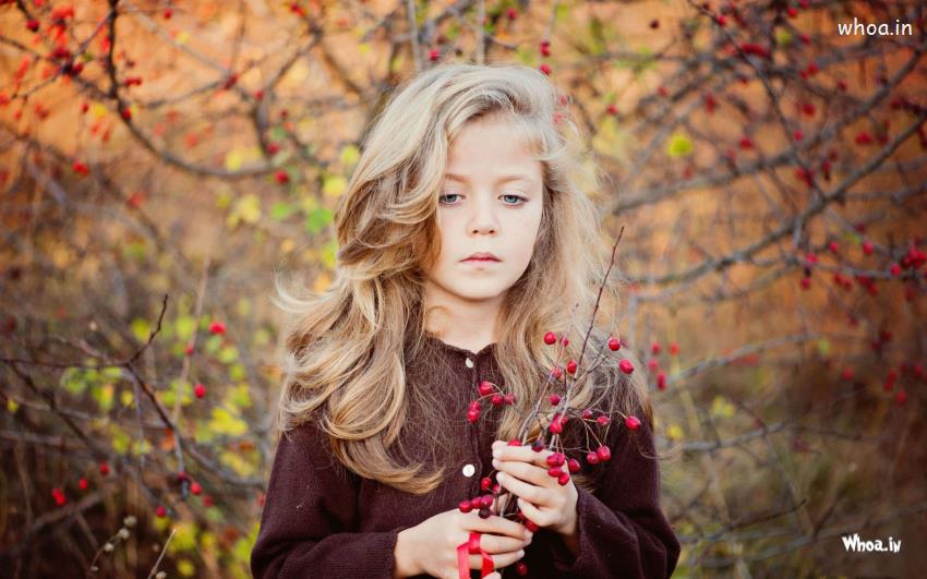 Sad Little Girl Berries Branches On Her Hand HD Cute Baby Wallpaper
