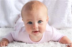 Cute Baby with brown eyes royalty-free images Down