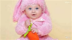 Grey Eyes Cheerful Cute Boy Baby Is Wearing Pink c