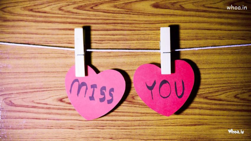I Miss You Massage On Two Heart Shape Paper
