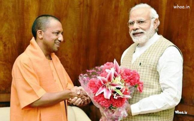 Image Of Yogi Aadityanath And PM  With Flower Bookay